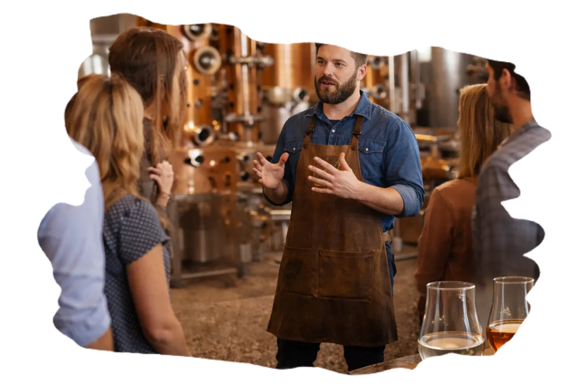Guests on a guided distillery tour